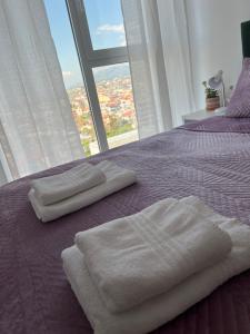 Katil atau katil-katil dalam bilik di Comfy Nest Apartment- free parking