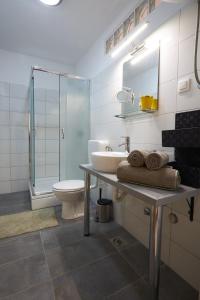 Koupelna v ubytování Apartment Yellow + 8 fotografií