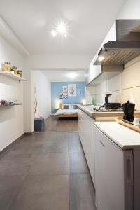 Kuchyň nebo kuchyňský kout v ubytování Apartment Blue