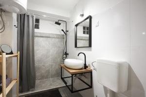 a bathroom with a toilet and a shower at Apartment Blue in Poreč