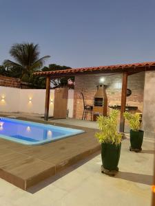 Πισίνα στο ή κοντά στο Casa com piscina para veraneio em Barra do Itariri - Bahia