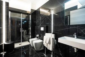 Łazienka w obiekcie Hotel Relais Dei Papi