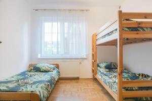 Ένα ή περισσότερα κρεβάτια σε δωμάτιο στο Apartament Cisza +4 φωτογραφίες