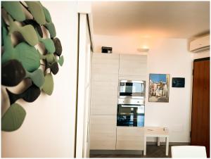 A kitchen or kitchenette at Casa Larentu