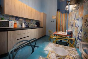 Kuchyň nebo kuchyňský kout v ubytování Casina Lambis + 37 fotografií