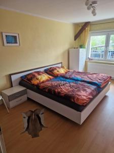 En eller flere senge i et værelse på Fewo an der Bode