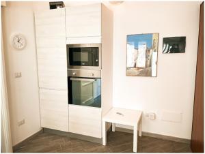 A kitchen or kitchenette at Casa Larentu
