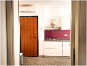 A kitchen or kitchenette at Casa Larentu