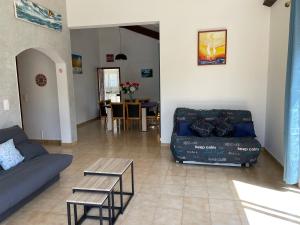 Posedenie v ubytovaní VILLA tous conforts avec Piscine privée et accès Plage