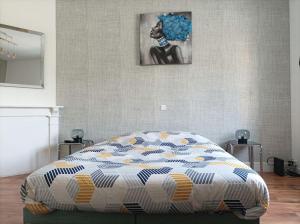 Postel nebo postele na pokoji v ubytování L'écume de mer