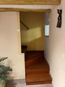 a hallway with a staircase in a house at Can Moletes in Pratdip