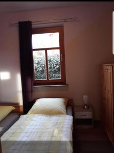 Postel nebo postele na pokoji v ubytování Haus Abendsonne