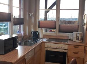 Kuchyň nebo kuchyňský kout v ubytování Haus Abendsonne