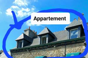 a picture of a building with the words apartment at Guingamp centre : grand appartement lumineux in Guingamp