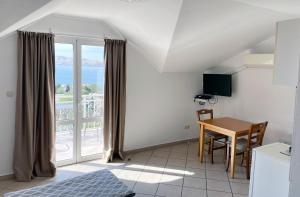 TV a/nebo společenská místnost v ubytování Apartment Anic