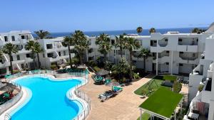an aerial view of a resort with a swimming pool at El Sueño Ocean Lanzamar - Puerto Del Carmen in Puerto del Carmen