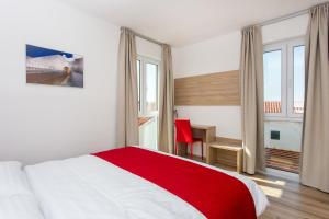 Posteľ alebo postele v izbe v ubytovaní Apartments Villa Ankora + 36 fotografií
