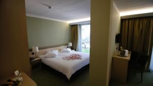 Кровать или кровати в номере Hotel Kimen - Annex