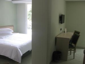 Кровать или кровати в номере Hotel Kimen - Annex