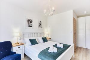 Łóżko lub łóżka w pokoju w obiekcie Villa Astoria