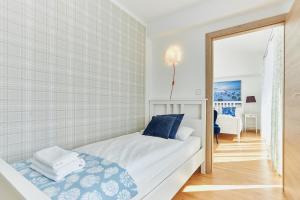 Łóżko lub łóżka w pokoju w obiekcie Villa Astoria