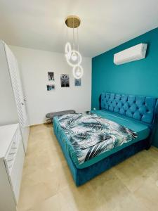 A bed or beds in a room at Selena bay