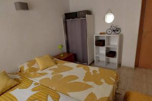 Postel nebo postele na pokoji v ubytování Apartamento Mediterráneo Salou! + 20 fotografií