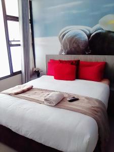 Postel nebo postele na pokoji v ubytování Tshilidzi Guest House