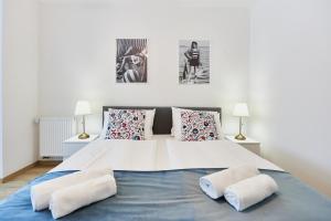 Łóżko lub łóżka w pokoju w obiekcie Villa Astoria