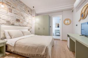 Postel nebo postele na pokoji v ubytování Hanedan Otel Foca Izmir