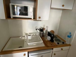 Kuchyňa alebo kuchynka v ubytovaní Appartement jusqu'à 4 personnes