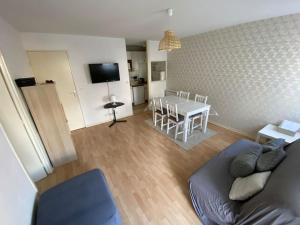 Televízia a/alebo spoločenská miestnosť v ubytovaní Appartement jusqu'à 4 personnes