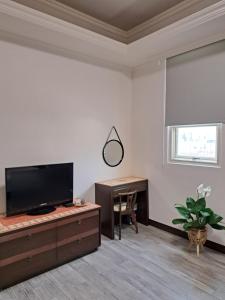 TV a/nebo společenská místnost v ubytování 澎湖民宿 7 Hostel