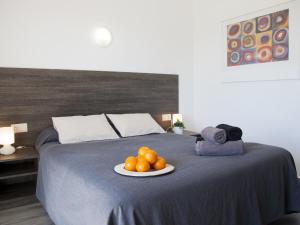 Cama o camas de una habitación en Apartaments Atzavara