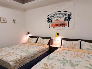 Postel nebo postele na pokoji v ubytování 澎湖民宿 7 Hostel