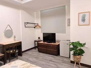 TV a/nebo společenská místnost v ubytování 澎湖民宿 7 Hostel