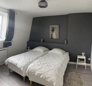 Posteľ alebo postele v izbe v ubytovaní Le Céleste