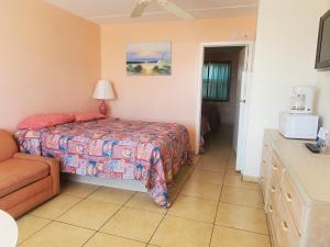 Postel nebo postele na pokoji v ubytování Caprice Motel - Wildwood