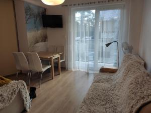 TV a/nebo společenská místnost v ubytování Apartament Nadmorski