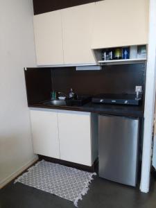 Kuchyň nebo kuchyňský kout v ubytování Appartement situé en plein centre à deux pas des pistes. + 3 fotografie