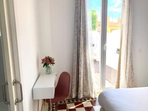 Posteľ alebo postele v izbe v ubytovaní Casa del Azucar