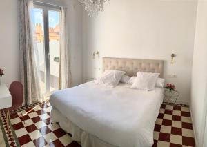 Posteľ alebo postele v izbe v ubytovaní Casa del Azucar