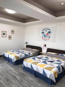 Postel nebo postele na pokoji v ubytování 澎湖民宿 7 Hostel