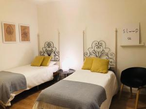 A bed or beds in a room at Nuevo Apartamento en Playa de las Canteras