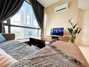a bedroom with a bed and a large window at SKS Pavillion Residence romantic luxury unit JBCC Netflix YouTube in Johor Bahru