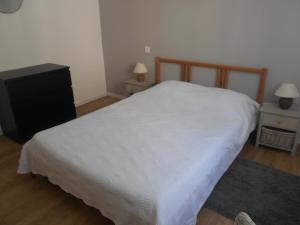 Postel nebo postele na pokoji v ubytování maison bleue