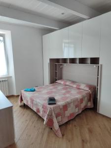 Posteľ alebo postele v izbe v ubytovaní Casa della Nonna casevacanzeargentario