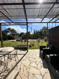 Fotografia z galérie ubytovania Les P'tits Apparts d'Angie - Logement Bohème v destinácii Porto-Vecchio