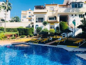 The swimming pool at or close to Casa Carlos