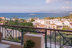 a view of a city from a balcony at Deja Blue Chania in Daratso